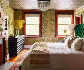 Transitional bedroom with floral wallpaper
