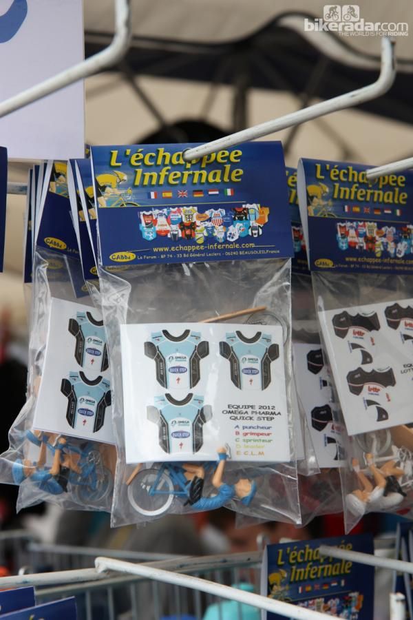 Only those with appropriate credentials can enter the official start village and team parking areas but the regions just on the other side of the barricades are filled with vendors hawking souvenirs.