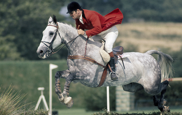 Harvey Smith of Great Britain, riding Speakeasy, in action during the Embassy Masters at the All England Jumping Course in Hickstead, West Sussex on 18th July, 1975. (Photo by Ed Lacey/Popperfoto/Getty Images)