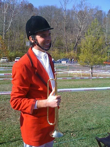 A red-coated bugler called the racers to action.