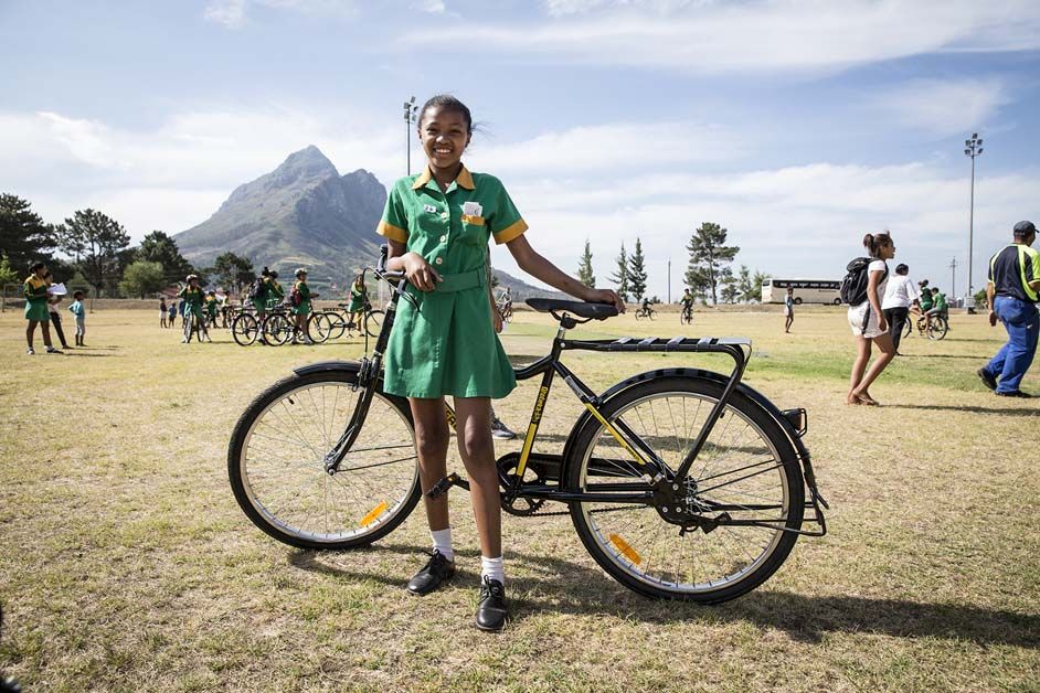 One of the school children with her new steed