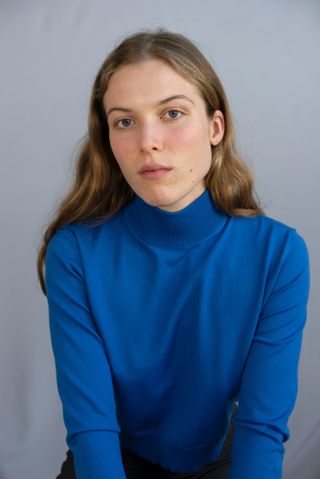 Portrait of woman in Max Mara sweater