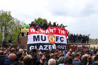 Manchester United fans protest against the club's owners
