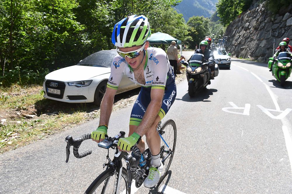 Adam Yates climbs during stage 18.