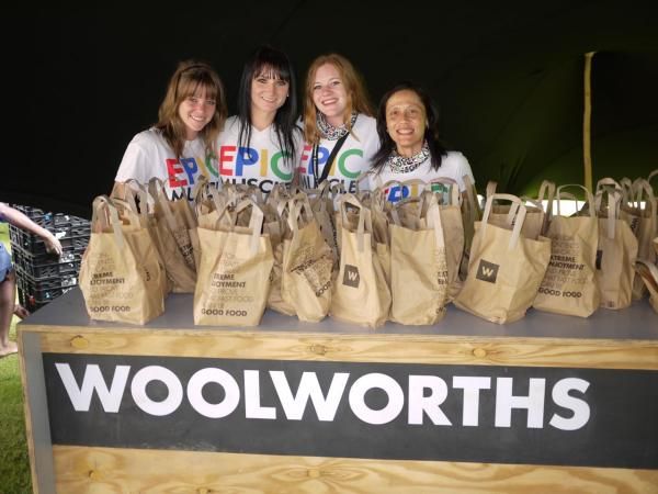 The Woolworths girls - just after they washing service takes your bike, these folks hand you a brown sack lunch.