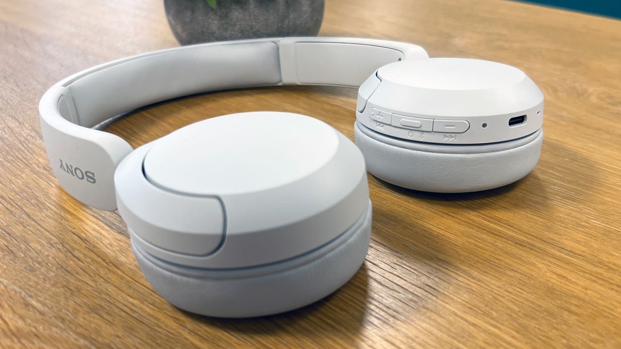 Sony WH-CH520 headphones on a wooden table