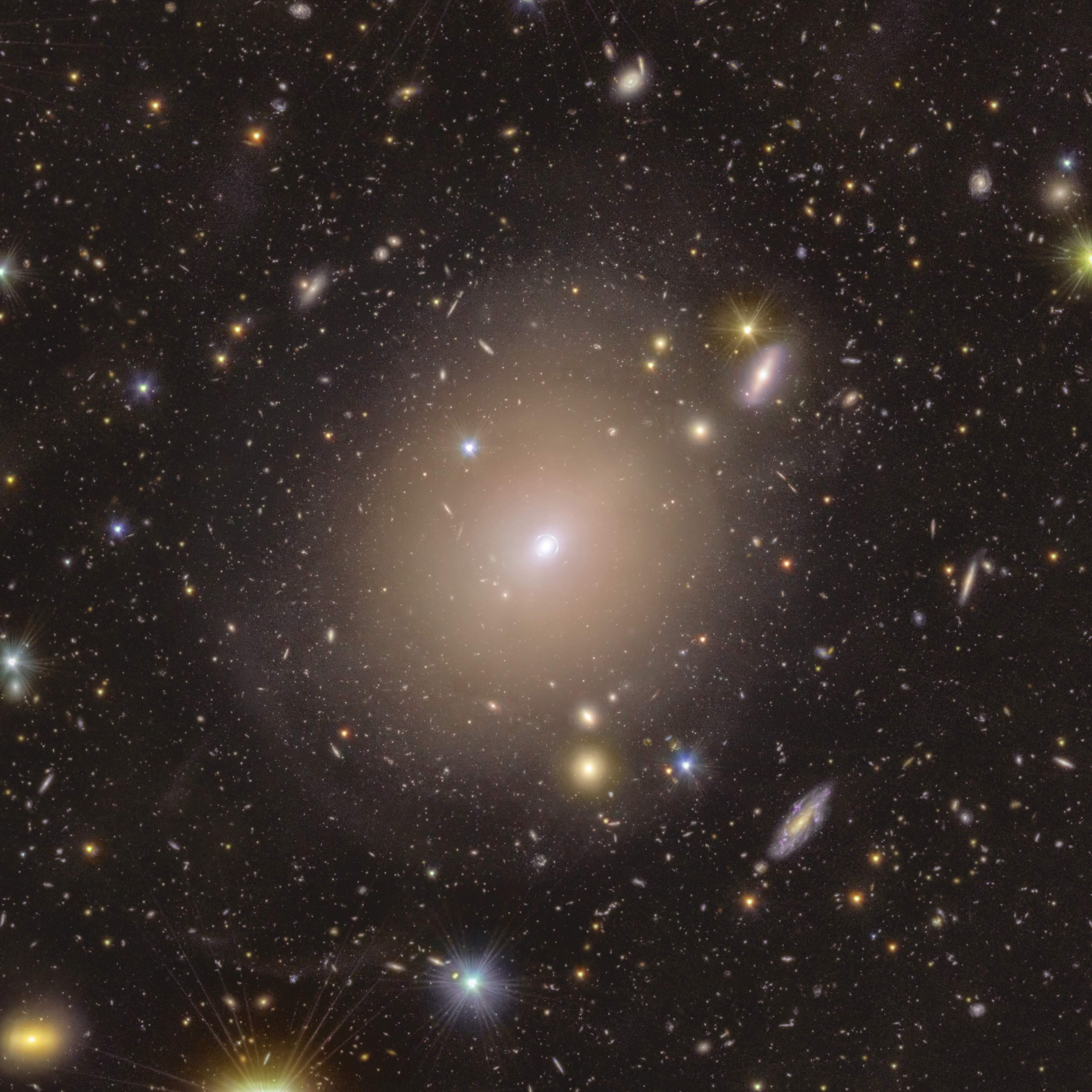 Image of the galaxy NGC 6505: the Einstein ring created by this gravitational lens can be seen in the center of the image.