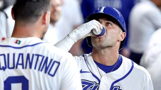 Italian baseball player drinking espresso