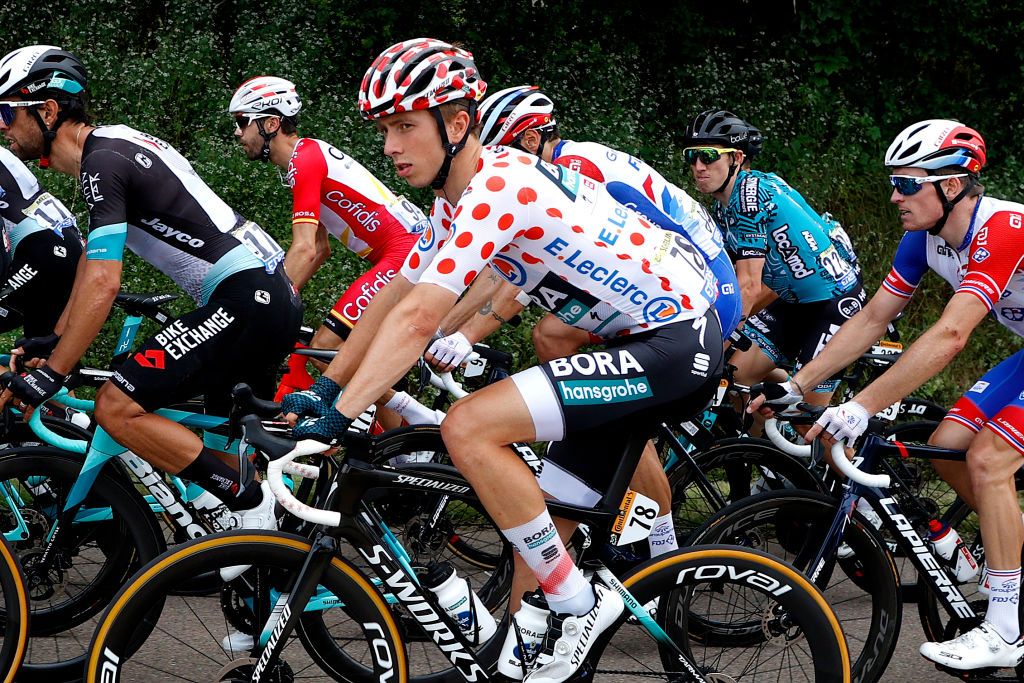 LE CREUSOT FRANCE JULY 02 Ide Schelling of The Netherlands and Team BORA Hansgrohe Polka Dot Mountain Jersey Arnaud Dmare of France and Team Groupama FDJ during the 108th Tour de France 2021 Stage 7 a 2491km km stage from Vierzon to Le Creusot 369m LeTour TDF2021 on July 02 2021 in Le Creusot France Photo by Chris GraythenGetty Images