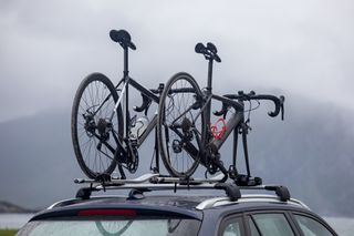 best bicycle insurance will protect your bikes from accidental damage, even when on a roof rack like the two in the image.