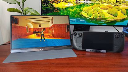 KYY Portable monitor connected to Steam Deck OLED with Tomb Raider gameplay on screen.