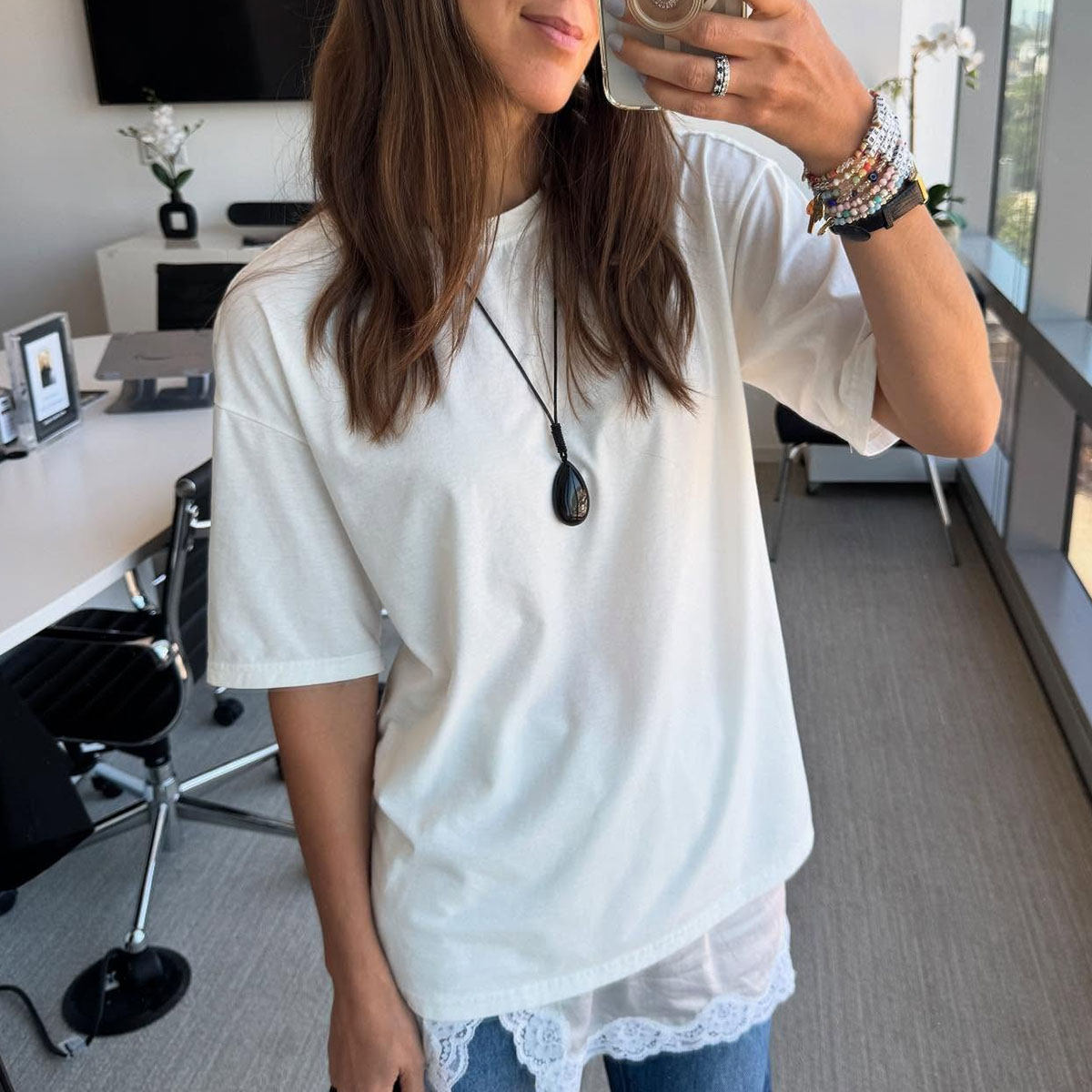 Woman in white t-shirt and jeans