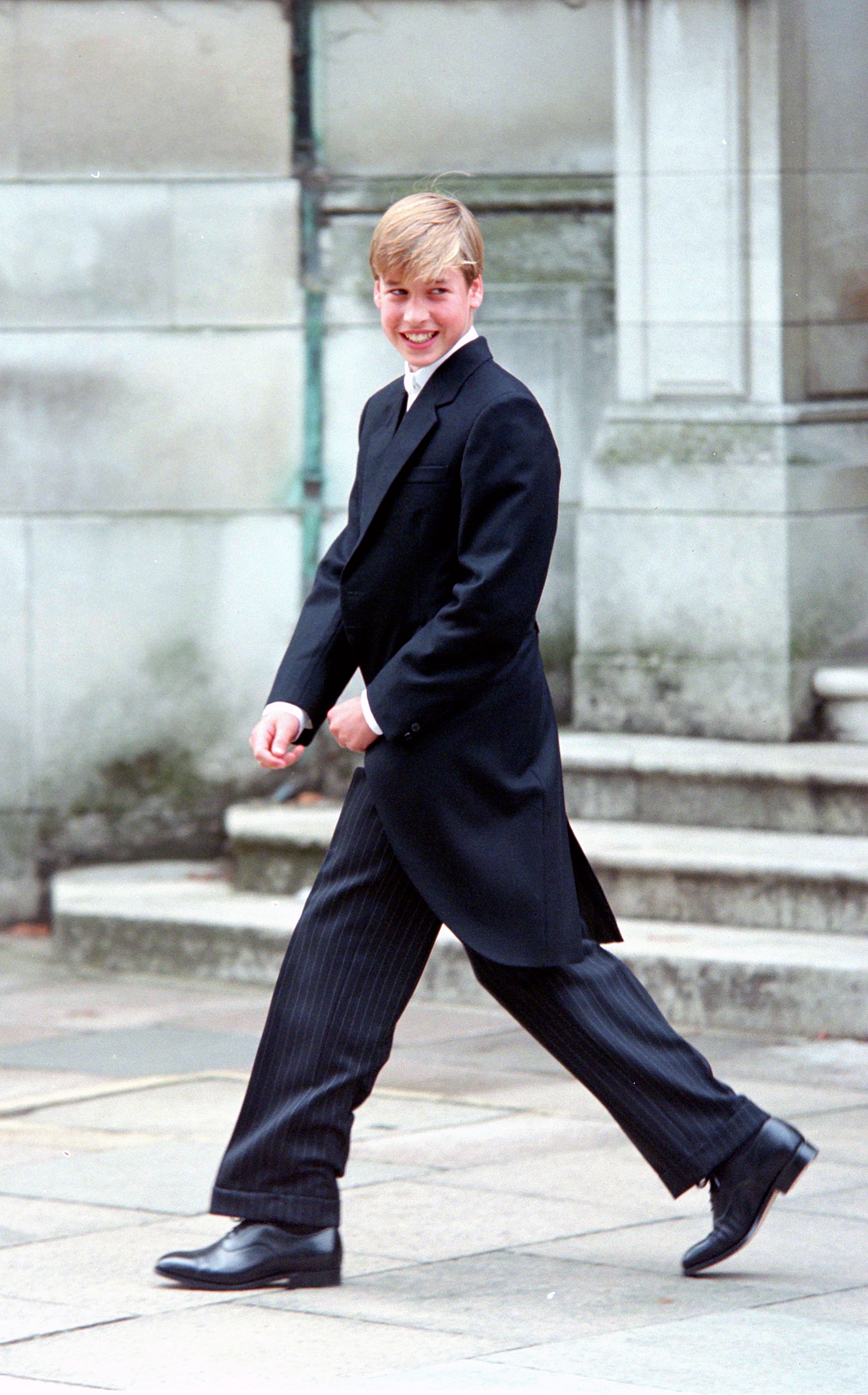 Prince William wearing a black school uniform at Eton College