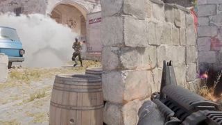 A player emerges from a cloud of smoke, as another player takes aim from near a wall.