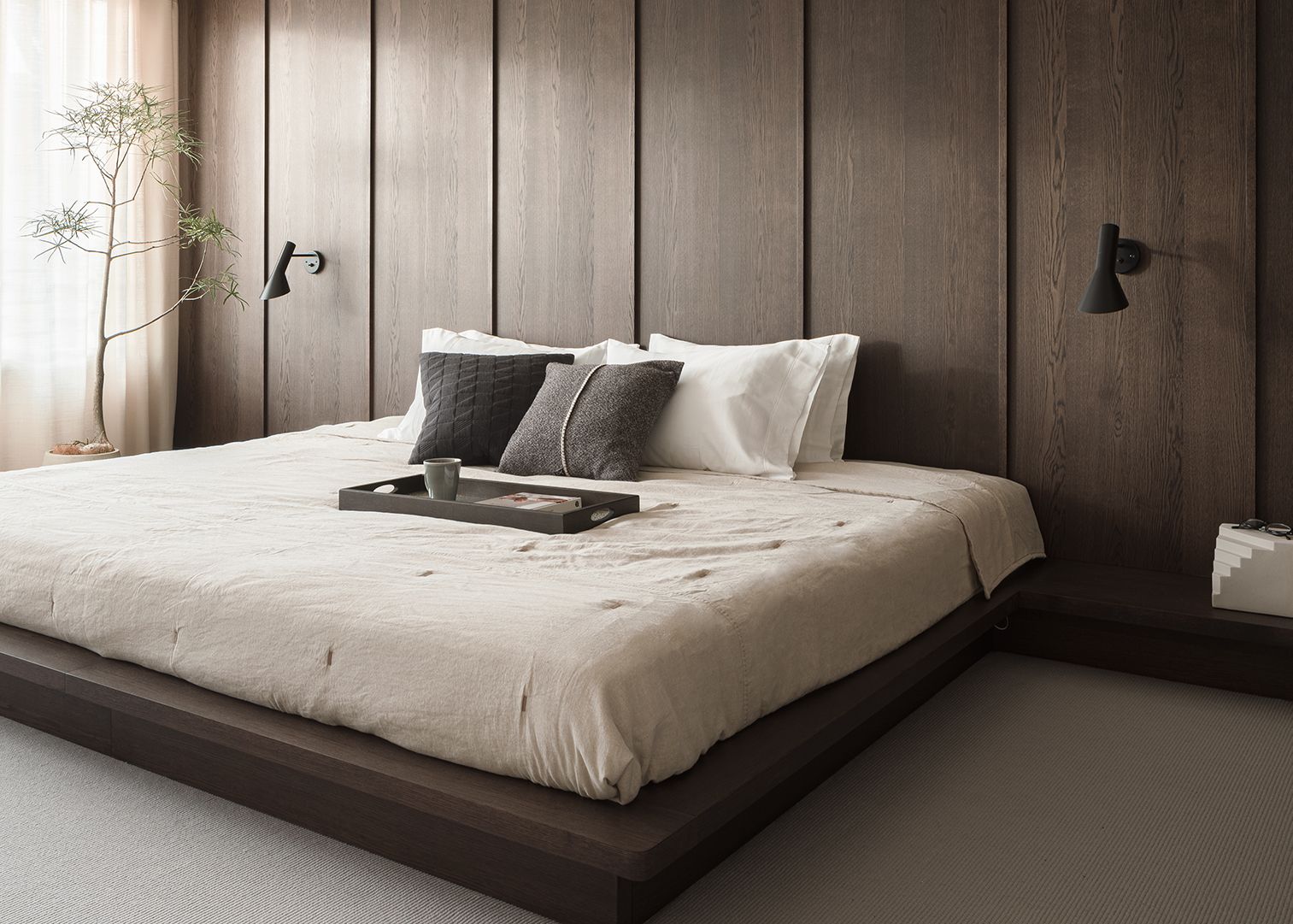 A scandi bedroom with a platform bed