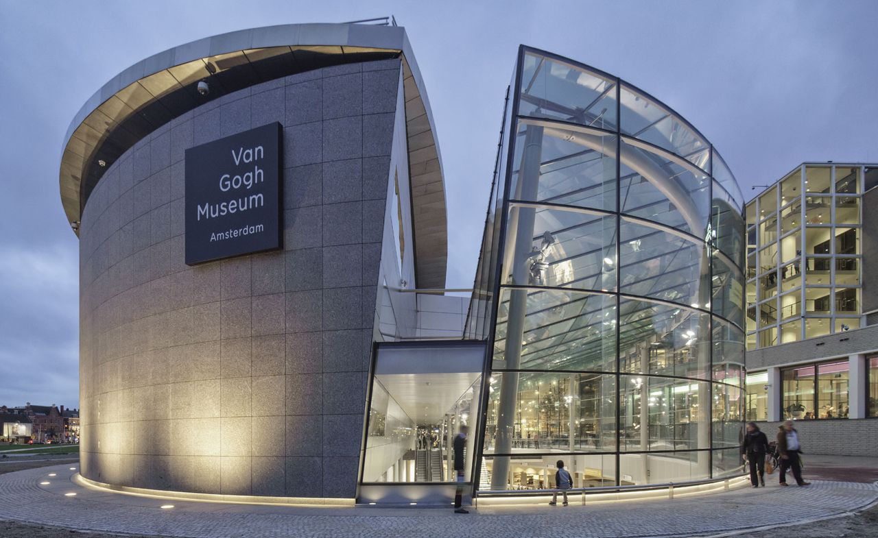 curved glass wall and roof are supported by a light, steel frame