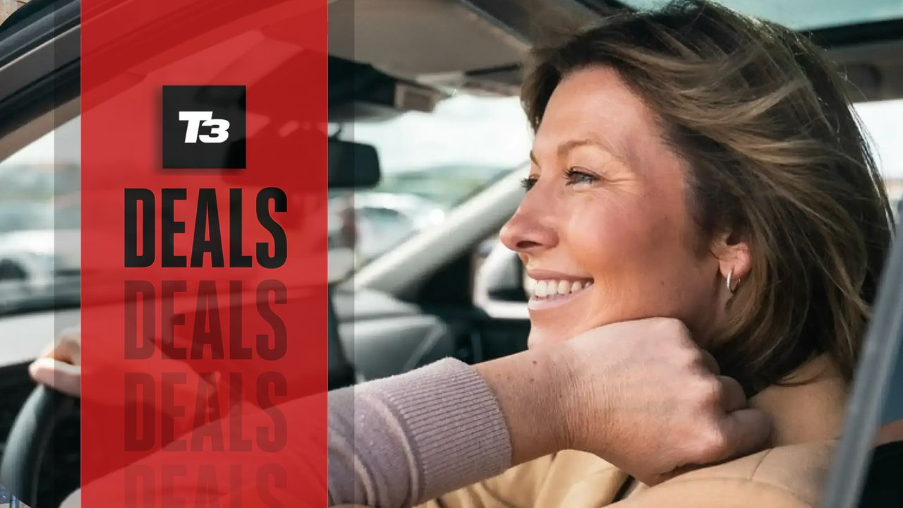 Woman looking out of a car similing with &#039;T3 DEALS&#039; overlay