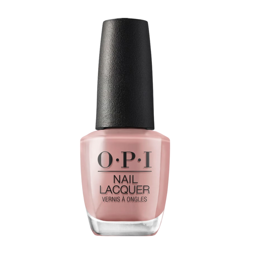 A product shot of the OPI Nail Lacquer in shade Barefoot in Barcelona (a warm, taupe-y brown), on a white background