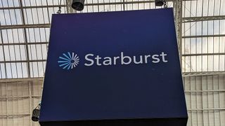 The Starburst logo hanging from the roof of Olympia exhibition centre in London during Big Data London