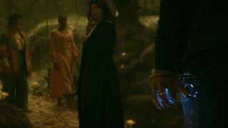 Screenshot of Agatha smiling at Teen's hand sparking blue power In Agatha All Along Episode 5