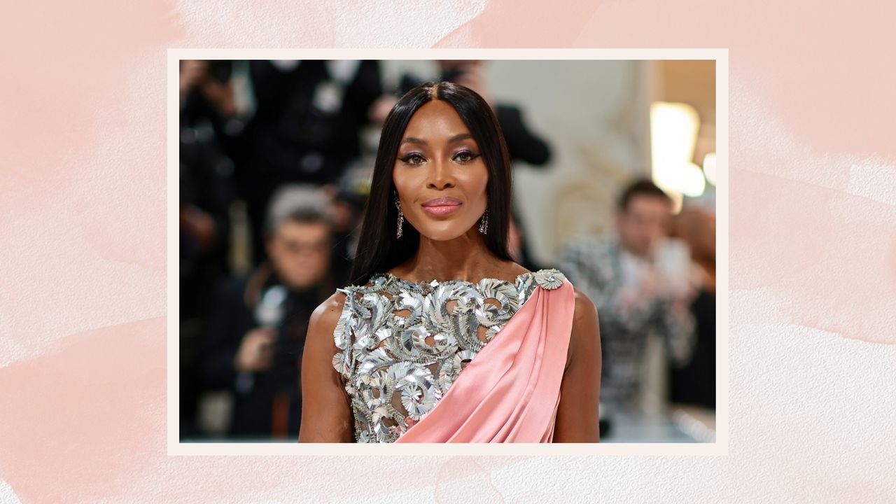 Naomi Campbell is pictured with long and straight glossy hair whilst wearing a silver and pink gown at the 2023 Met Gala Celebrating &quot;Karl Lagerfeld: A Line Of Beauty&quot; at The Metropolitan Museum of Art on May 01, 2023 in New York City/ in a pastel pink watercolour-style template