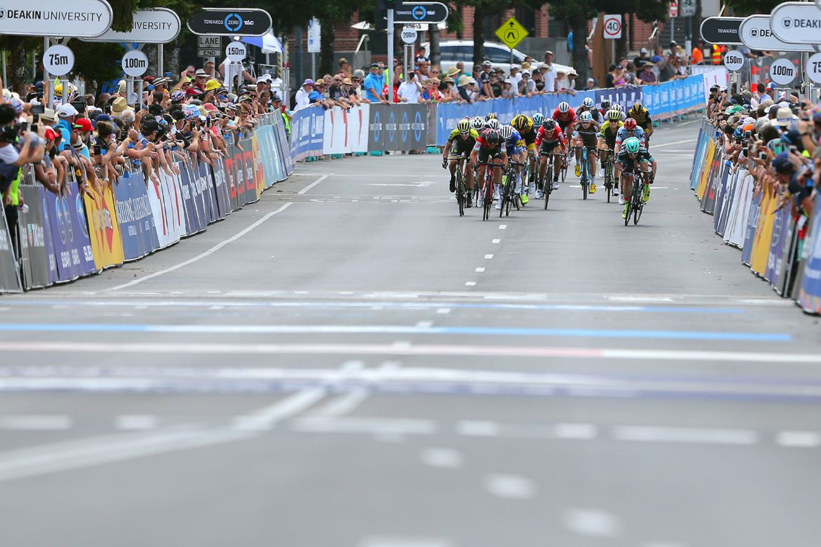 The lead group rounds the final bend