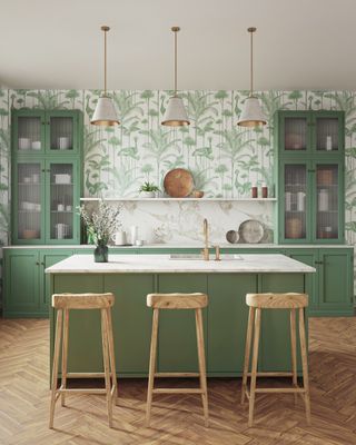 green crane wallpaper on feature wall in kitchen with sage cabinetry and oak barstools