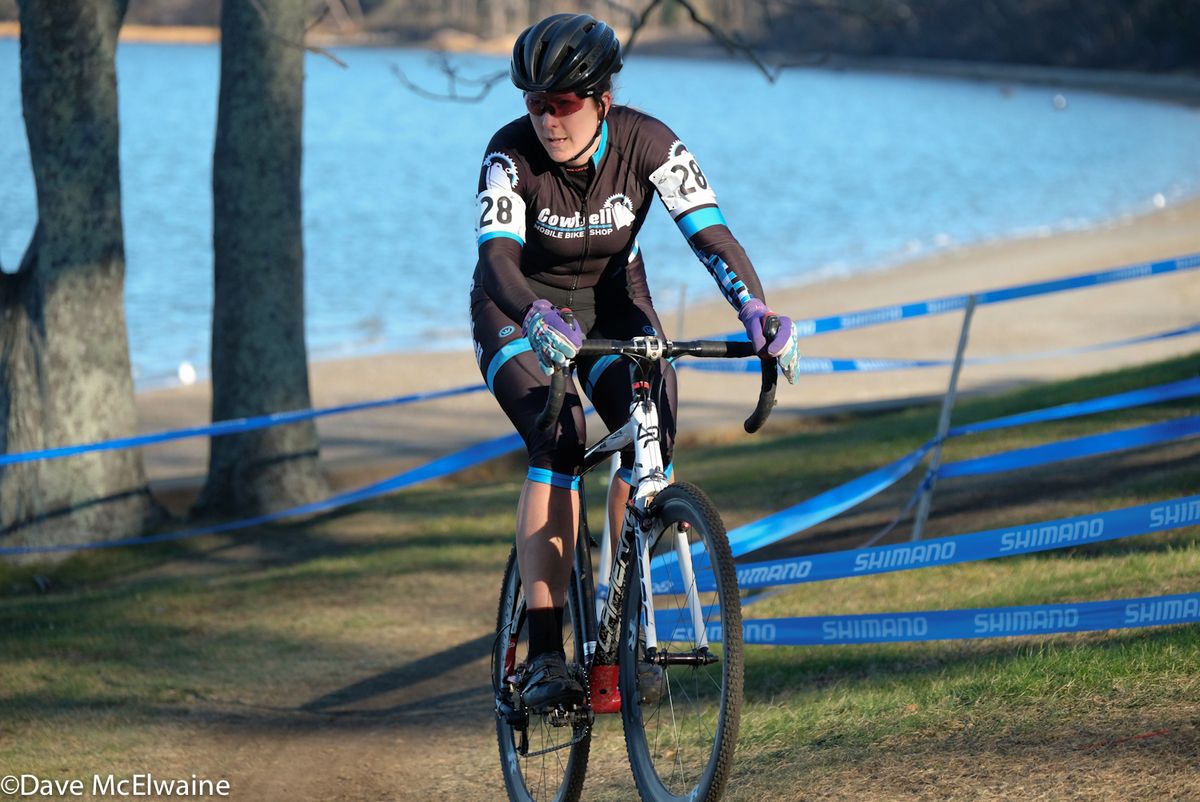 Alix Norris (Cowbell Racing) climbing near the beach