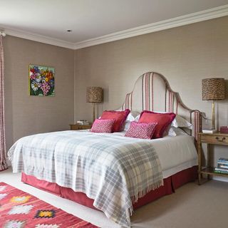 master bedroom with side table and table lamp