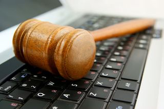 Legal hammer on keyboard