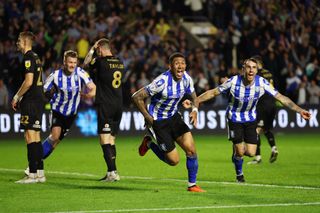 SHEFFIELD, ENGLAND - MAY 18: Liam Palmer of Sheffield Wednesday celebrates after scoring the team's fourth goal during the Sky Bet League One Play-Off Semi-Final Second Leg match between Sheffield Wednesday and Peterborough United at Hillsborough on May 18, 2023 in Sheffield, England. (Photo by Matt McNulty/Getty Images)