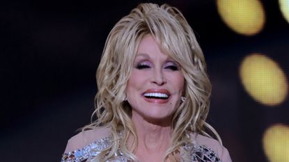 Co-host Dolly Parton speaks onstage during the 57th Academy of Country Music Awards at Allegiant Stadium on March 07, 2022 in Las Vegas, Nevada. 