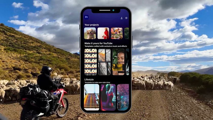 A smartphone displaying the home screen of the Premiere Pro video editing app is centered over a background photo of a motorcycle rider surrounded by a large flock of sheep on a dirt road in a sunny, mountainous landscape.