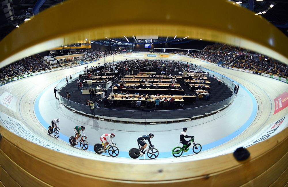 Germany's Maximilian Dornbach, South Africa's Jean Spies, Japan's Tomoyuki Kawabata and New Zealand's Edward Dawkins take part in the Men's Keirin