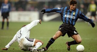 25 Nov 1998: Javier Zanetti of Inter Milan beats Roberto Carlos of Real Madrid during the UEFA Champions League match at the San Siro in Milan, Italy. Inter won 3-1. \ Mandatory Credit: Ben Radford /Allsport