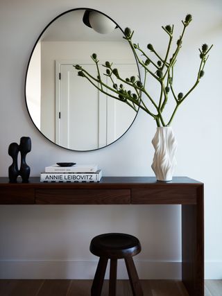 entry way with side table and mirror