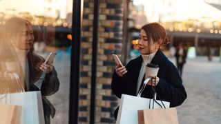 a woman with shopping bags