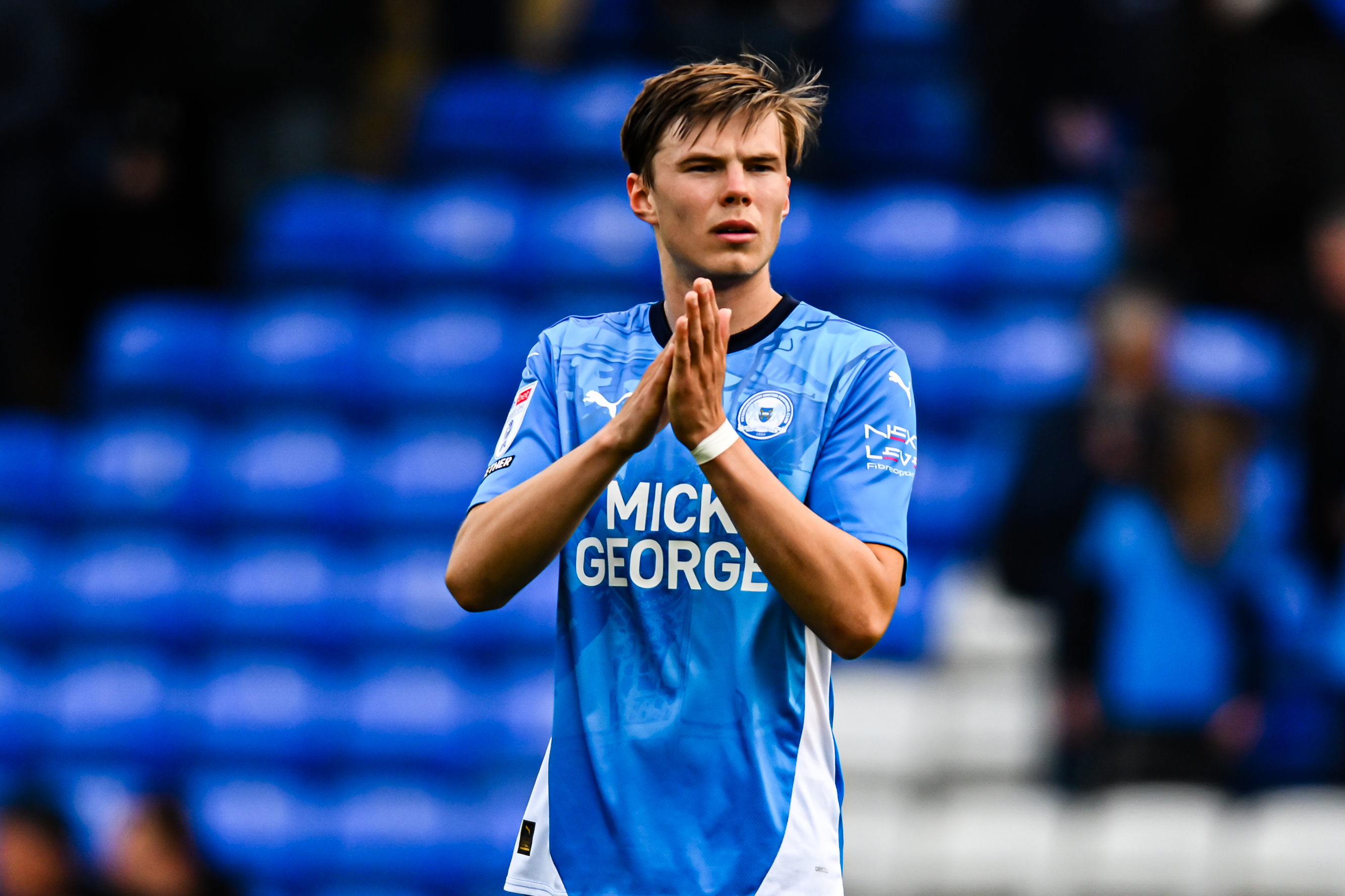 Oscar Wallin of Peterborough United applauds fans after the final whistle during the Sky Bet League 1 match between Peterborough and Stockport County in Peterborough, England, on April 18, 2025. (Photo by Kevin Hodgson/MI News/NurPhoto)