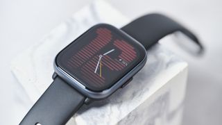 The Amazfit Active on a marble block