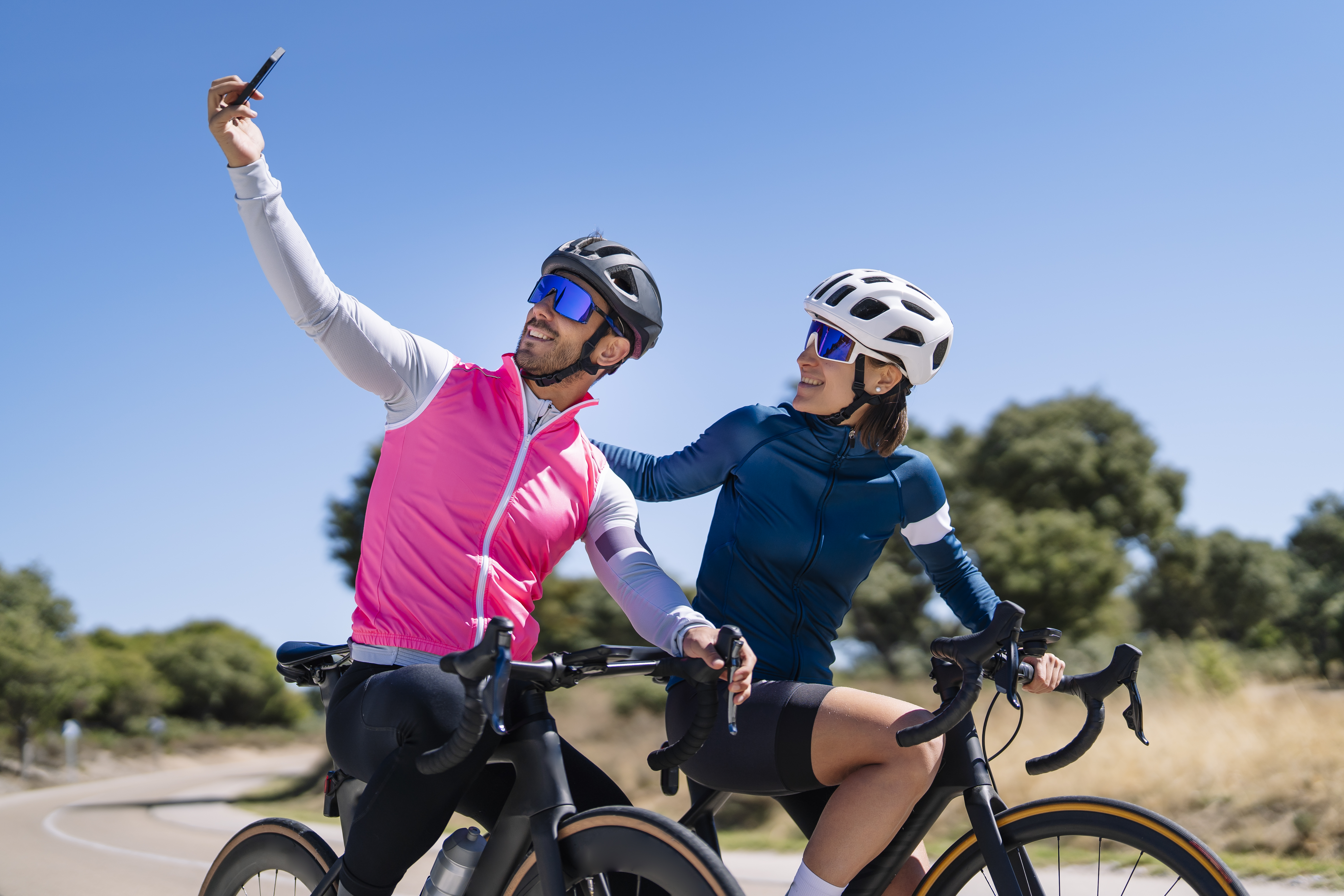 Happy cyclists in the summer take a selfie