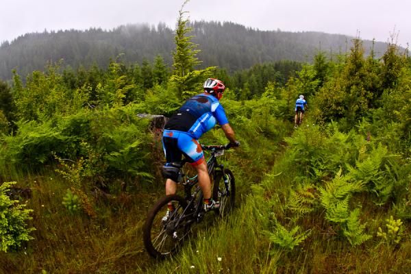 A Team Dirt rider descends the Path of Imagination