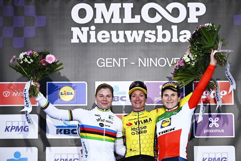 Belgian Lotte Kopecky of SD Worx - Protime, Dutch Marianne Vos of Team Visma-Lease a Bike and Italian Elisa Longo Borghini of Lidl-Trek celebrate on the podium of the women&#039;s one-day cycling race Omloop Het Nieuwsblad (UCI World Tour), 127,1km from Gent to Ninove, Saturday 24 February 2024.
BELGA PHOTO JASPER JACOBS (Photo by JASPER JACOBS / BELGA MAG / Belga via AFP)