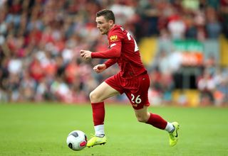 Andrew Robertson is happy to play through the pain for Liverpool