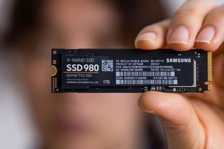an SSD storage drive being held to camera