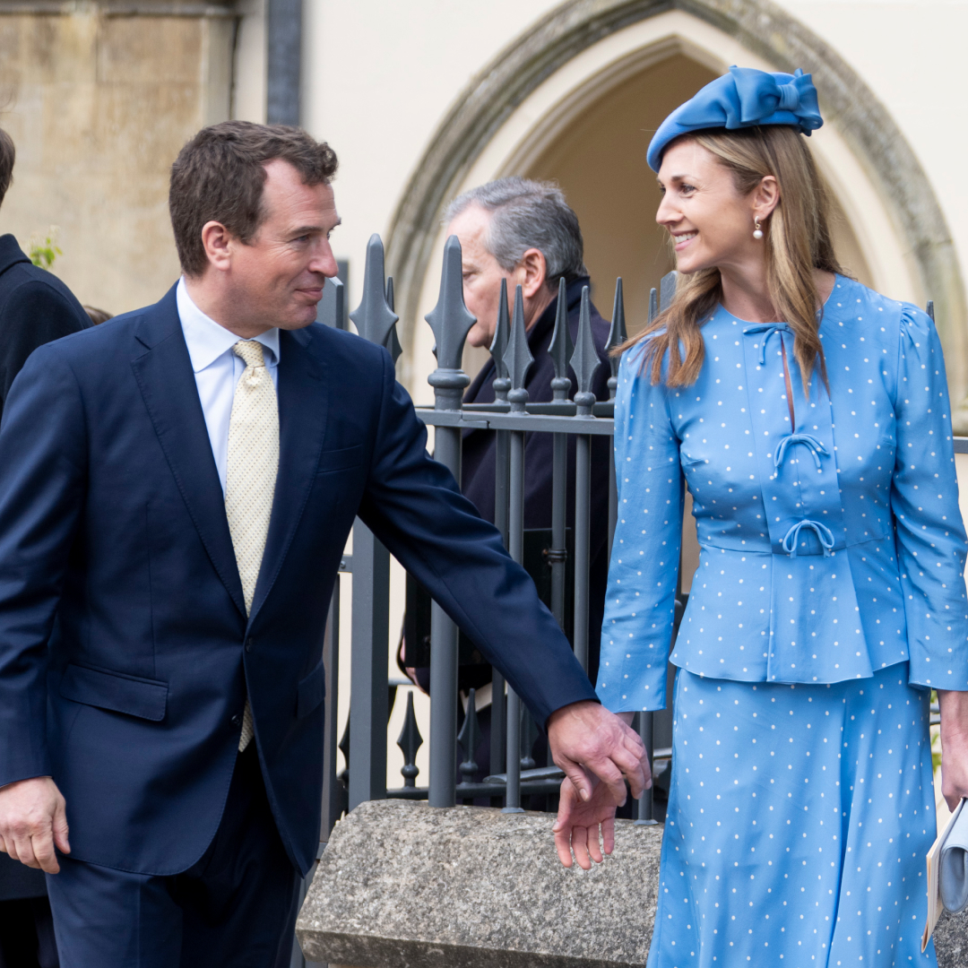 Harriet Sperling and Peter Phillips holding hands outside church