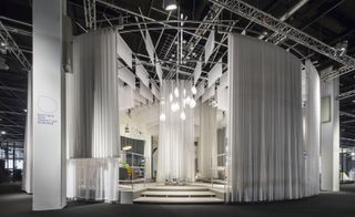 Mobile Nya Nordiska curtains and layers of Dinesen GrandDouglas flooring structure the space