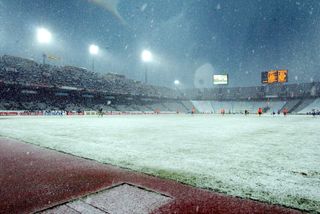 Espanyol and Valencia in action at a snowy Montjuic in February 2004.