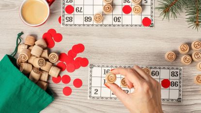 A person playing Christmas party games and bingo