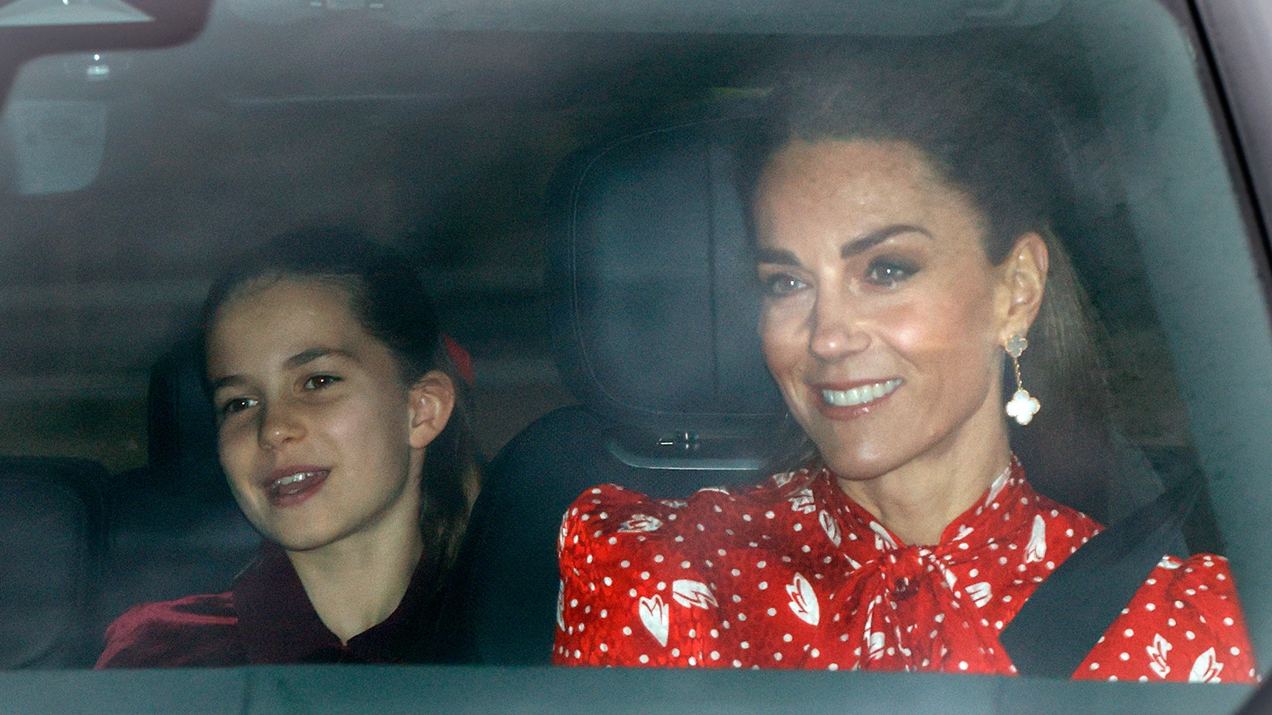 Princess Charlotte of Wales and Catherine, Princess of Wales are driven to attend a Christmas Lunch for members of the Royal Family, hosted by King Charles III, at Buckingham Palace on December 16, 2025