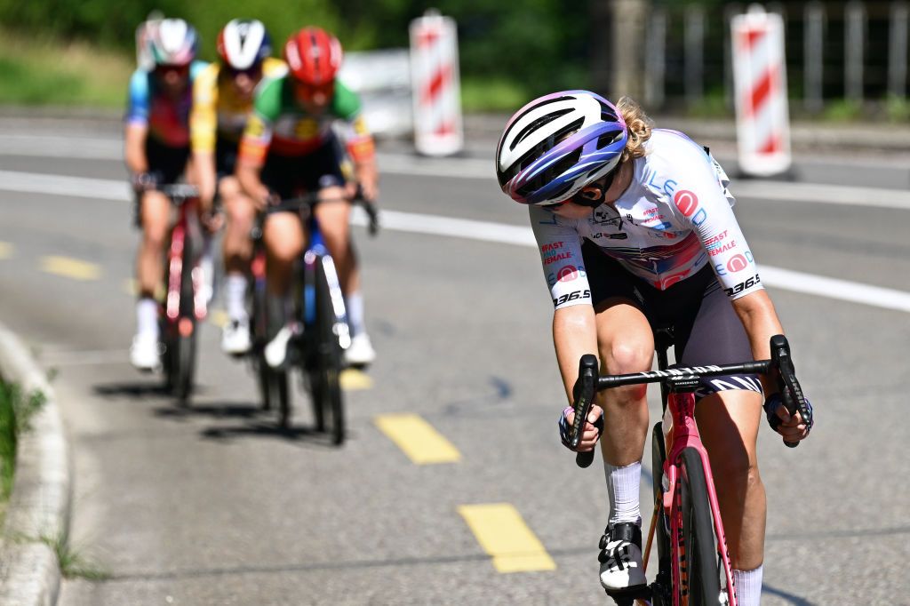 CHAMPAGNE SWITZERLAND JUNE 18 Neve Bradbury of Australia and Team CanyonSram Racing White Best Young Rider Jersey attacks during the 4th Tour de Suisse Women 2024 Stage 4 a 1275km stage from Champagne to Champagne UCIWWT on June 18 2024 in Champagne Switzerland Photo by Tim de WaeleGetty Images